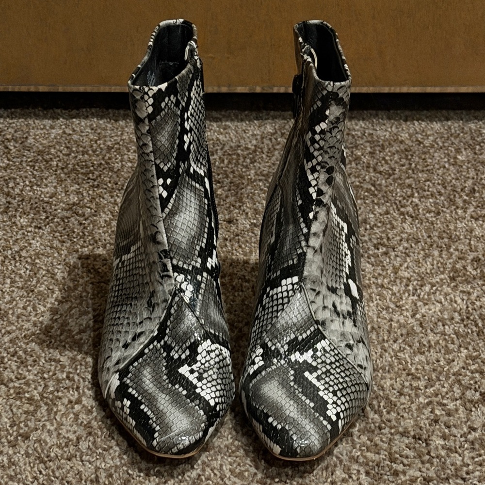 Elegant Snakeskin Heeled Boots